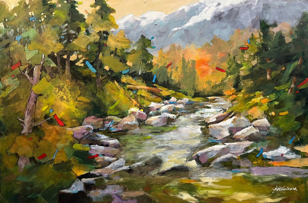 a river in mountainous surrounding.